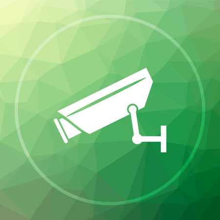 Surveillance camera icon. Surveillance camera website button on green low poly background.の写真素材