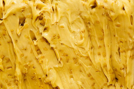 The structure of Honey. Honey with whipped cream, nuts, chocolate, fruitの写真素材