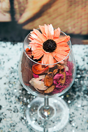 Home decor. Flower and decorative chips in the wine Fougeresの写真素材