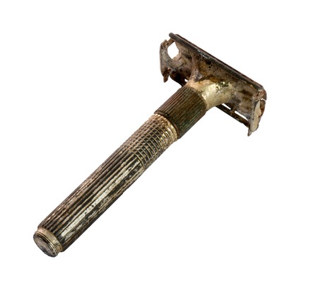 old rasty safety razor. Close-up. Isolated on white background.の写真素材