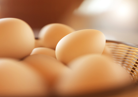 Brown eggs in the basket. 3D rendering illustration.の写真素材