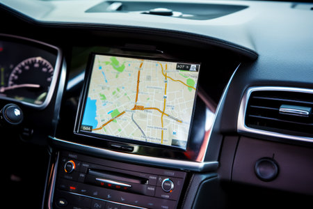 Car dashboard with gps device in the center of the dashboard and map in the center of the dash. Generative AI.の素材