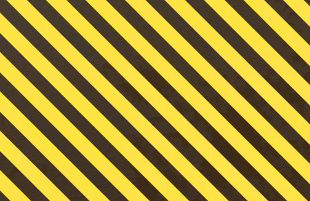 Industrial warning background with yellow and black diagonal hazard stripes featuring a rough and...