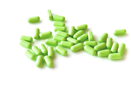 A heap of green pillsの写真素材