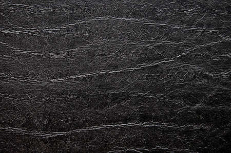 Old and dark leather backgroundの写真素材