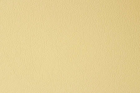 The beige knurled metal backgroundの写真素材