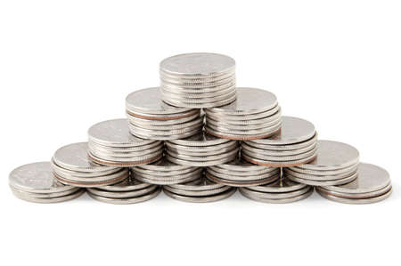 Coin pyramid on white background の写真素材