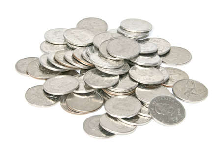 Pile of coins on white background の写真素材