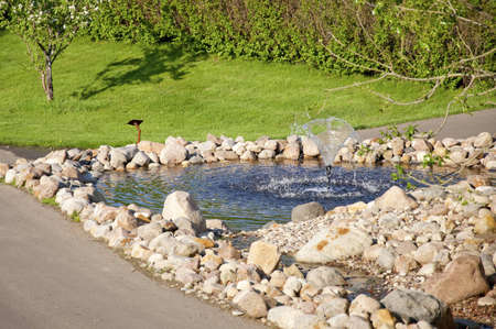 Decorative small  fountain whith blue water