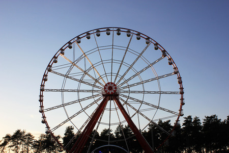 Vintage Retro Ferris Wheel on Blue Sky.  Front view. Ferris Wheel at amusement parkのeditorial素材