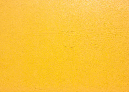 Yellow leather background. Old leather texture.の写真素材