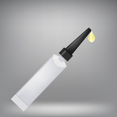 Metal Tube of Super Glue Isolated on Grey Background. Yellow Drop of Glue.のイラスト素材