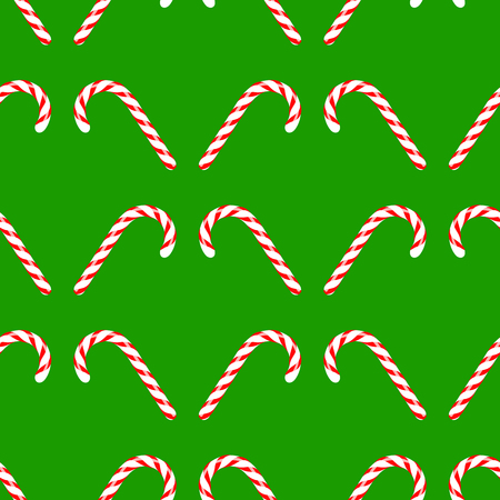 Candy Cane Icon Isolated on Green Background. Christmas Seamless Patternのイラスト素材