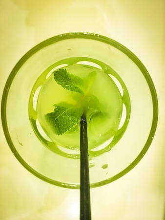 Tropical juce drink. Cold tasty fruit cocktail moxito. Top viewの写真素材