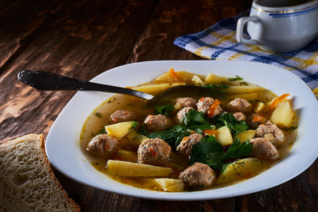 soup with meatballs breakfast in the early morningの写真素材