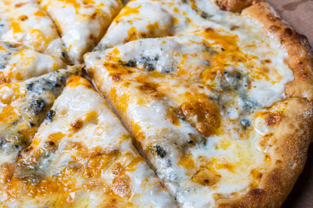 fresh cooked pizza with cheeseの写真素材