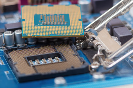 Bottom side of an modern CPU, showing its pins and CPU Socket on Motherboardの写真素材