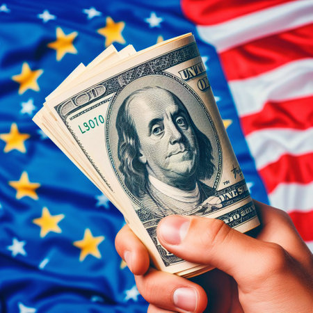 Hands holding dollar banknotes on the background of the flag of the United States of Americaの素材