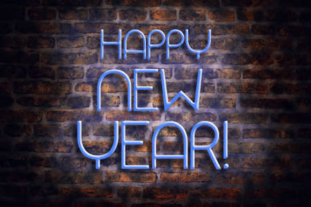 Neon inscription Happy New Year on brick wall background. Christmas background. Vacation.の写真素材