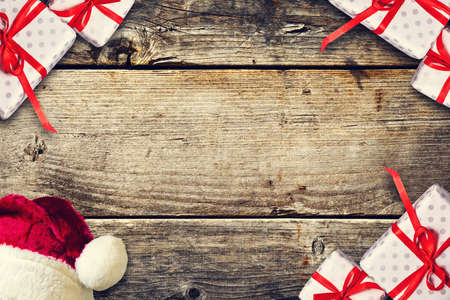 Composition with Christmas gifts on a wooden background. Copy space. New Year, Christmas background. Holidays.の写真素材