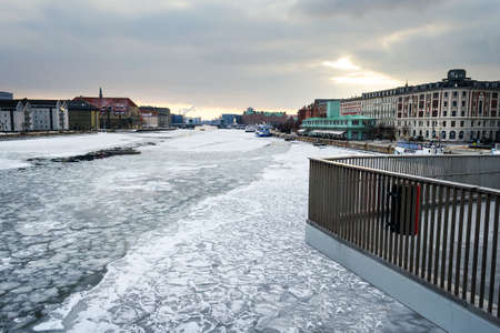 Copenhagen. Denmark March 3, 2018. Copenhagen frozen canal with beautiful ships. Natural phenomena. Architecture Seasonsの写真素材