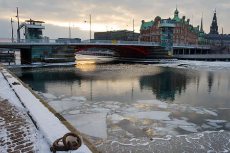 Copenhagen. Denmark March 3, 2018. Copenhagen frozen canal with beautiful ships. Natural phenomena. Architecture Seasonsの写真素材