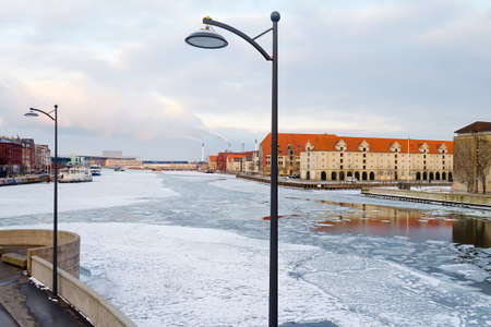 Copenhagen. Denmark March 3, 2018. Copenhagen frozen canal with beautiful ships. Natural phenomena. Architecture Seasonsの写真素材
