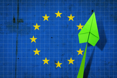 Upward arrow on the background of the flag of European Union. Paper plane. Economic recovery. Copy space.3D illustration. Business.の写真素材