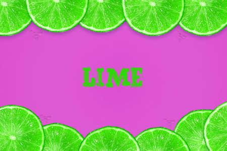 Sliced juicy lime on a purple background. Fresh fruit. Fruit background. Summer Party.Birthday.Bright Colorful.の写真素材