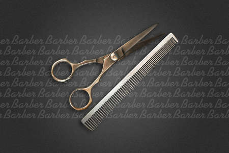 Hairdressing scissors and a hairbrush on a dark background. Barber Shop background. Copy space. Beauty and fashion background. Background.の写真素材