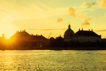 Beautiful silhouettes of buildings at sunset. Copenhagen. Denmark. European architecture. Architecture.の写真素材