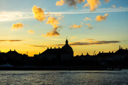 City of Copenhagen. Beautiful silhouettes of historical buildings at sunset. Denmark. European architecture. Architecture.の写真素材