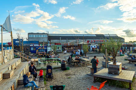 Copenhagen. Denmark. 12. September. 2021. Reffen Street Food Market. People are resting in beautiful street cafes. Landmarks of Copenhagen. Denmark. Recreation Travelのeditorial素材