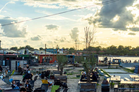 Copenhagen. Denmark. 12. September. 2021. Reffen Street Food Market. People are resting in beautiful street cafes. Landmarks of Copenhagen. Denmark. Recreation Travelのeditorial素材