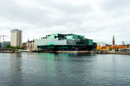Copenhagen. Denmark. 12. September. 2021. Beautiful modern glass building on the bank of the canal in Copenhagen. Denmark. European architecture. Architecture. Europe.のeditorial素材