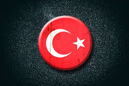 Turkey flag. Round badge, on a dark background. Signs and Symbols. Flags.の写真素材