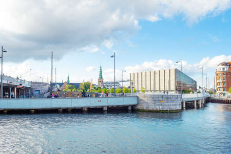 Copenhagen. Denmark. 12. September. 2021. Beautiful modern and brick, historic buildings on the bank of the canal in Copenhagen, Denmark. European architecture. Architecture. Europe.のeditorial素材