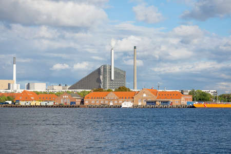 Copenhagen. Denmark. 12. September. 2021. Beautiful iew of Amager Bakke factory with skiing slope on the rooftop in Copenhagen, Denmark. Sights. Europe.のeditorial素材