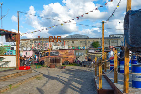 Copenhagen. Denmark. 12. September. 2021. Reffen Street Food Market. People are resting in beautiful street cafes. Landmarks of Copenhagen. Denmark. Recreation Travelのeditorial素材