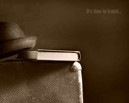 Old vintage suitcase on a wooden floor.Travel concept with a place for the text.Sepia toningの写真素材