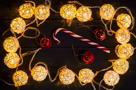 Glowing New Year garlands and ornaments on a dark background. Copy space.Holidays.Christmas, New Year. Cardの写真素材