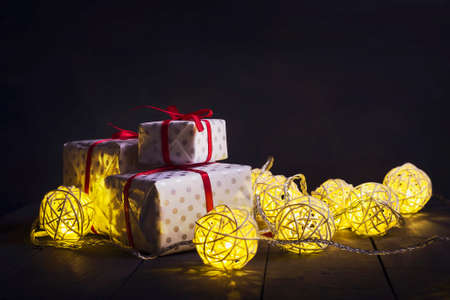 Glowing New Year garlands and ornaments on a dark background. Copy space.Holidays.Christmas, New Year. Cardの写真素材