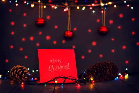 Christmas composition with gifts, Christmas toys and glowing garland. A greeting card. Holidays. Gifts.の写真素材
