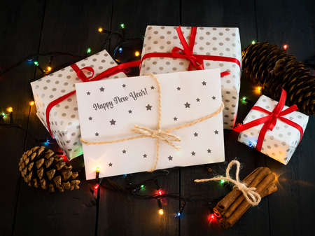A composition with New Year's gifts and an envelope with the inscription Happy New Year Greeting card. New Year. Holidays.の写真素材
