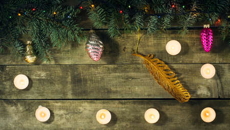 Christmas New year composition with candles on the old wooden background.Top viewの写真素材