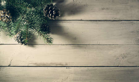 Christmas New Year composition on old wooden background. Top view with copy spaceの写真素材