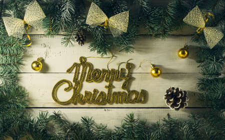Christmas New year composition with branches of spruce on the old wooden background.Top viewの写真素材