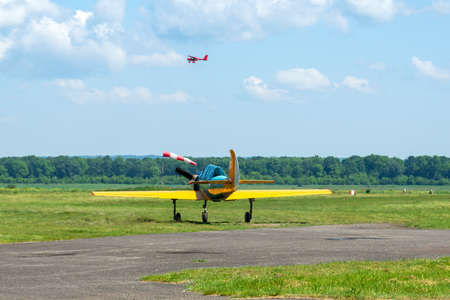 Gorodok. Ukraine. June 6, 2021. Tsuniv airfield. Training aircraft, taxiing to the runway. Sport Extreme entertainment Transport Relaxationのeditorial素材