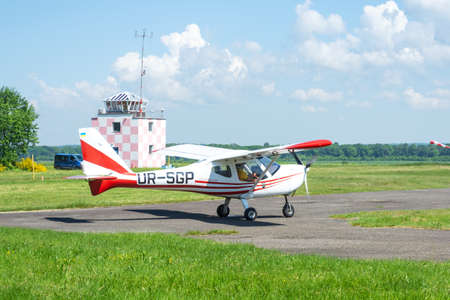 Gorodok.Ukraine. June 6, 2021. Tsuniv airfield. Training aircraft, preparation for the flight. Pilot...