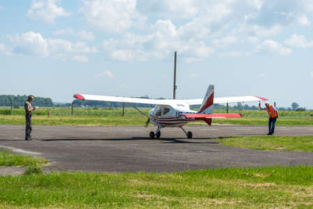 Gorodok.Ukraine. June 6, 2021. Tsuniv airfield. Training aircraft, preparation for the flight. Pilot...